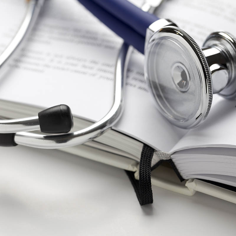 Stethoscope on book