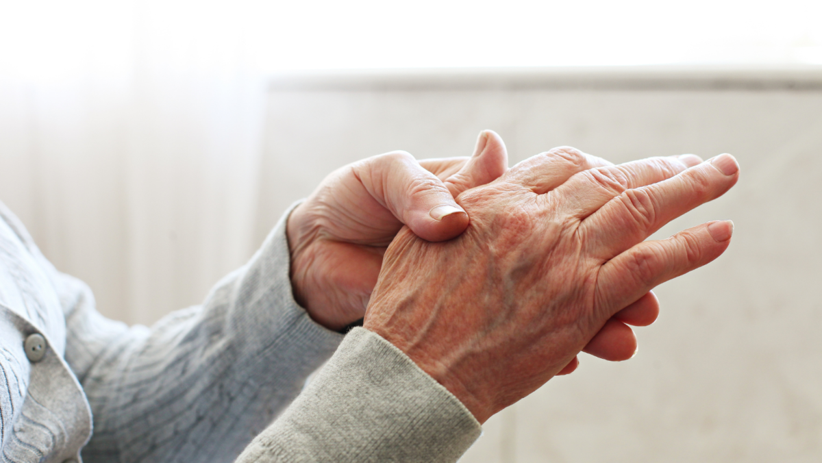 Older woman with arthritis in her hands